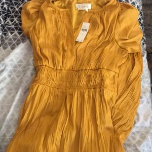 Anthropologie somerset dress color mango.